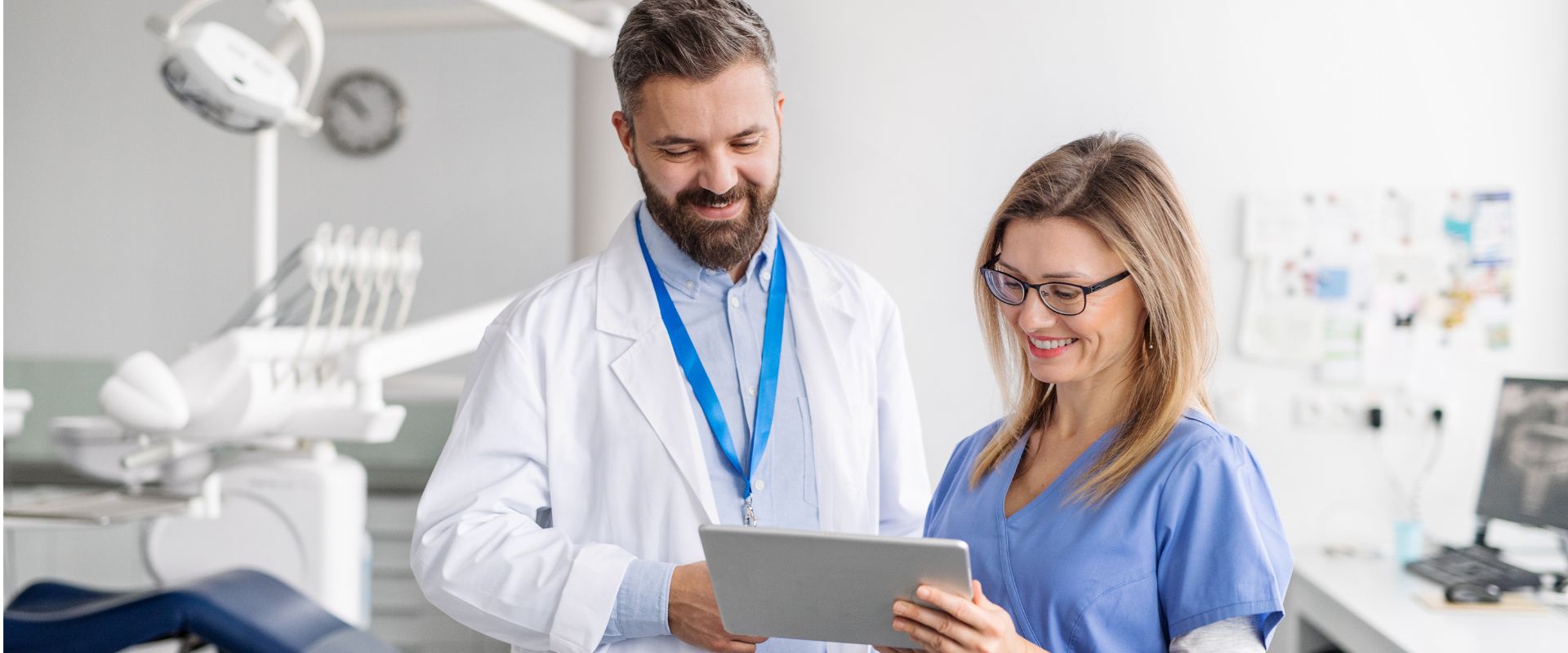 Dental assistant with a dentist