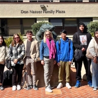International students in the Don Nasser Family Plaza on campus