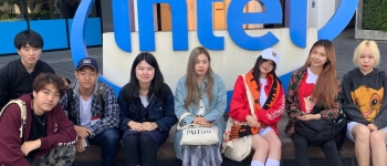 Touring English language students outside Intel headquarters